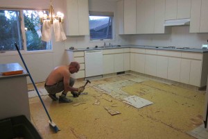 Ripping out the existing lino and underlay in our kitchen and dining room.